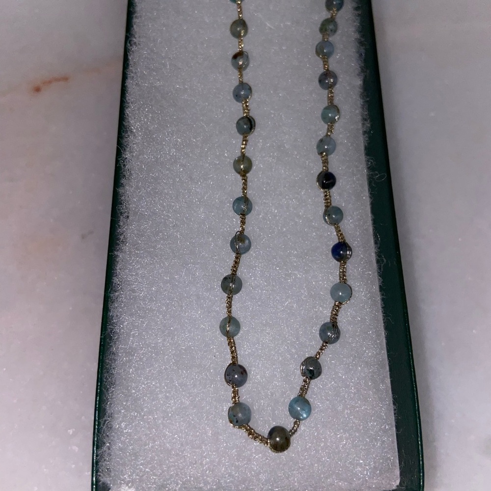 Elegant Beaded Necklace with Gold Accents